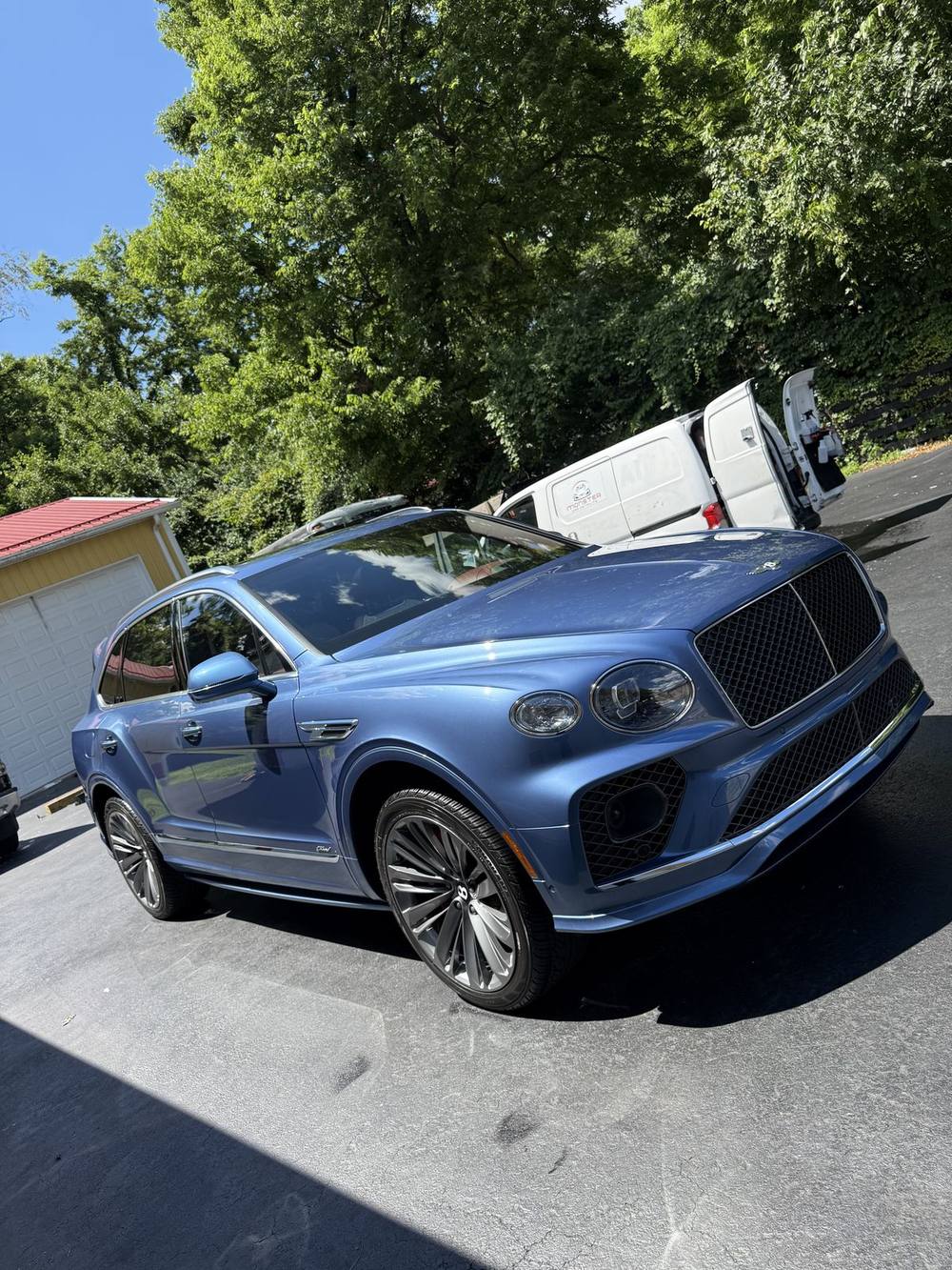 Blue Bentley Bentayga after a mobile detail in Louisville, KY